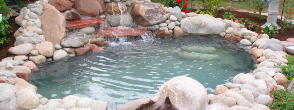 Discover the Tranquil Beauty of River Rock Ponds: 10 Ideas to Transform Your Backyard into an Oasis